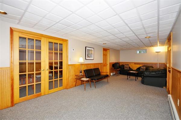 7 Senator Road Woburn, MA 01801 - Photo 16 of 26 a bedroom with furniture and a window