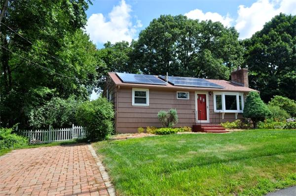 7 Senator Road Woburn, MA 01801 - Photo 24 of 26 a front view of house with yard and green space