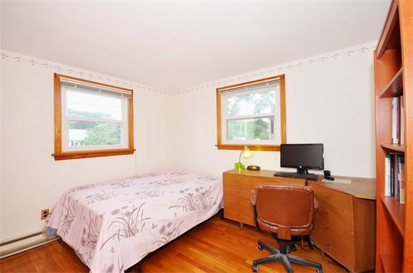 7 Senator Road Woburn, MA 01801 - Photo 10 of 26 a bedroom with a workspace