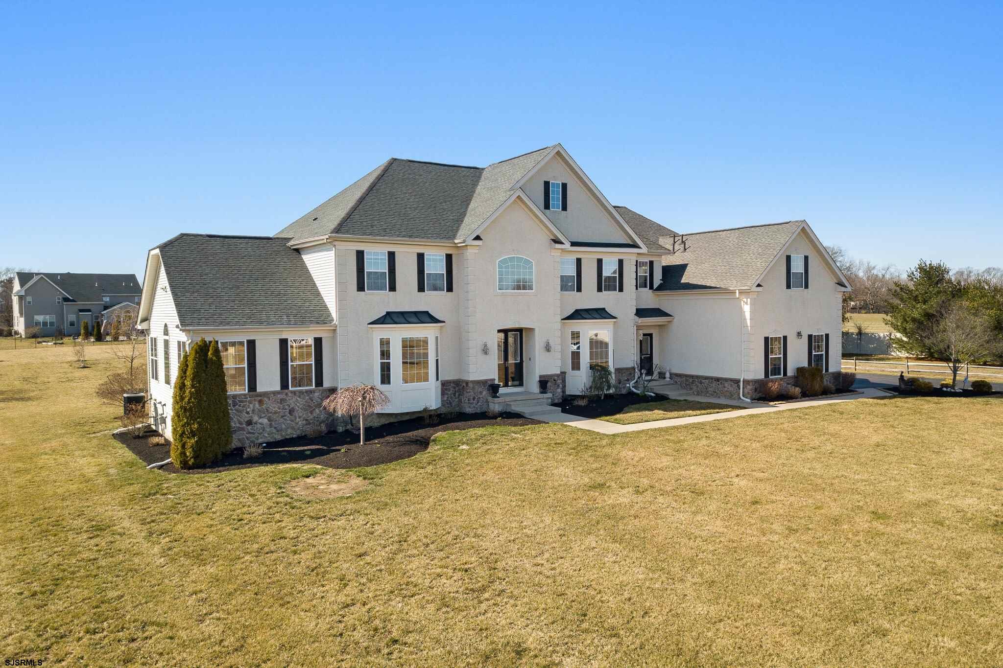 175 Greenview Court Clarksboro, NJ 08020 - Photo 3 of 25 a front view of a house with a yard