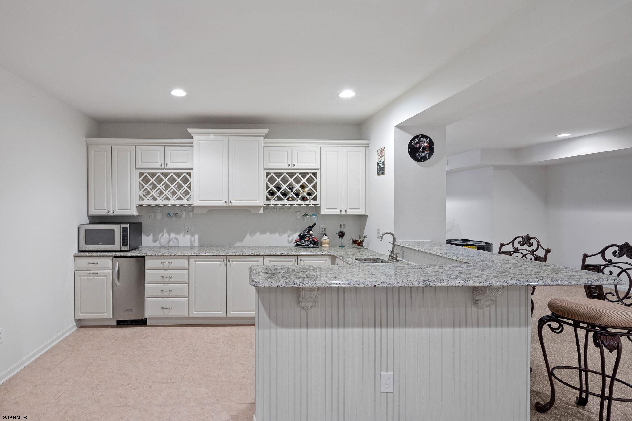 175 Greenview Court Clarksboro, NJ 08020 - Photo 21 of 25 a kitchen with stainless steel appliances granite countertop a sink and a refrigerator