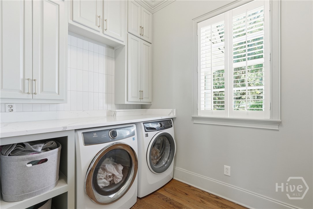2024 Walthour Road Savannah, GA 31410 - Photo 19 of 46 Laundry room with new cabinets, laundry sink