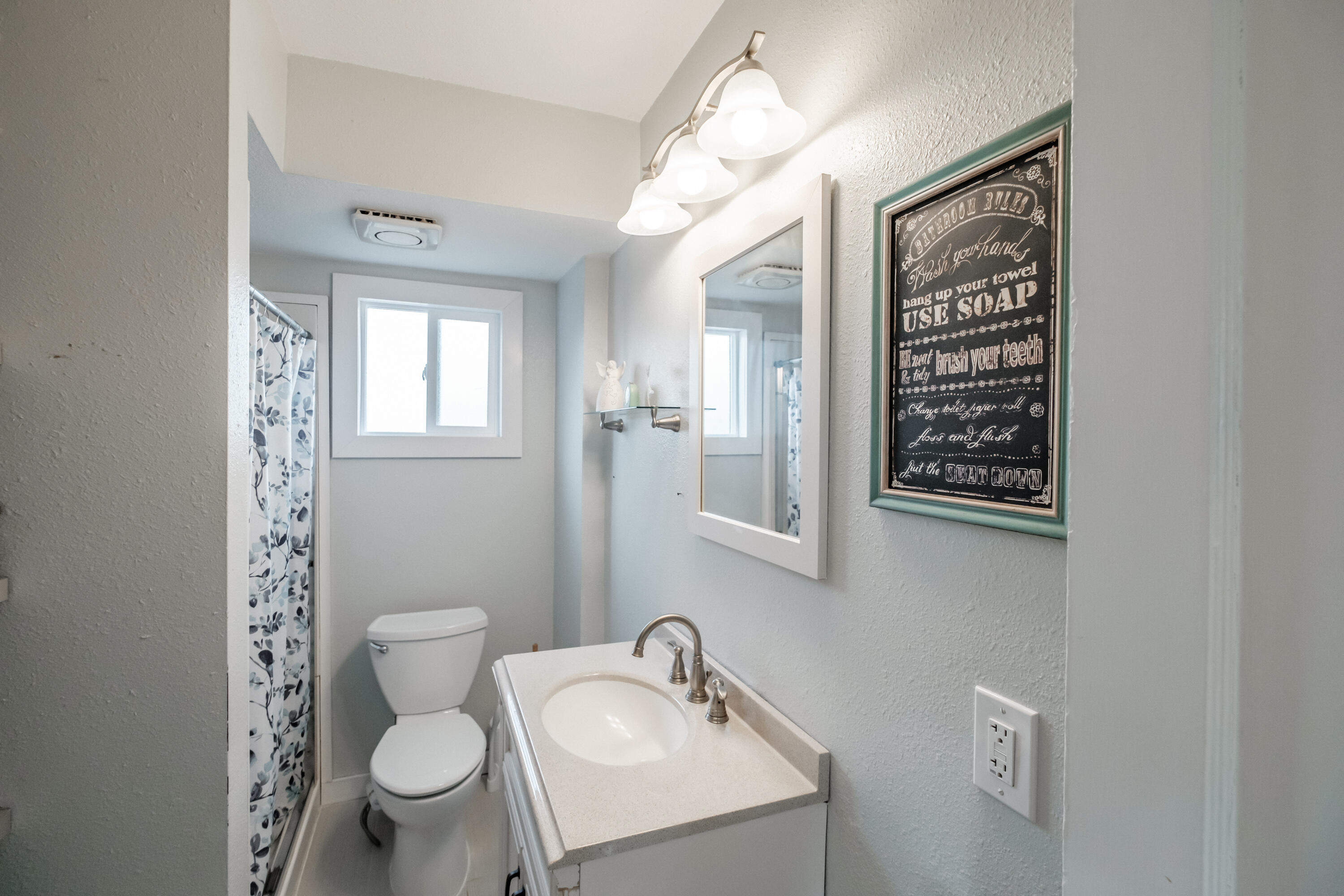 12495 Clow Corner Road Dallas, OR 97338 - Photo 22 of 50 a bathroom with a toilet a sink and mirror