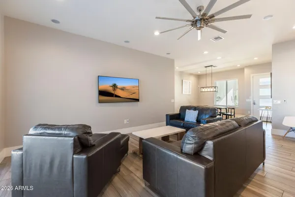 a bathroom with a shower and a sink
