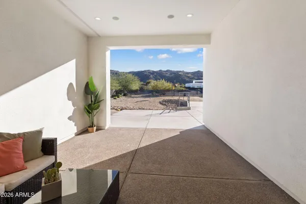 a large kitchen with stainless steel appliances lots of counter space and a sink