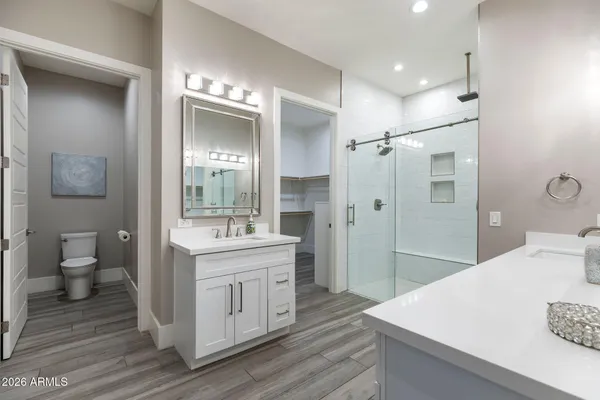 a utility room with sink dryer and washer