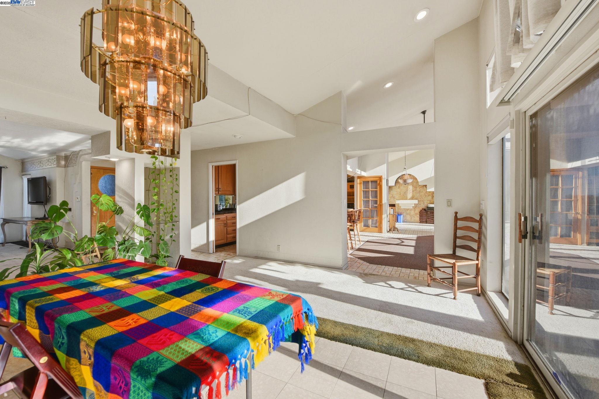 29673 Holiday Street Hayward, CA 94544 - Photo 21 of 47 a room that has a bed and a chandelier