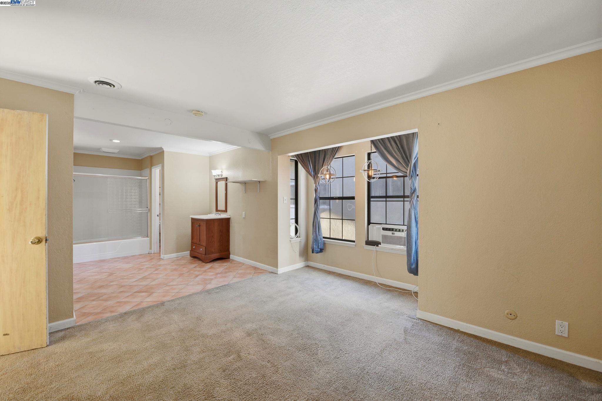 29673 Holiday Street Hayward, CA 94544 - Photo 33 of 47 an empty room with a cabinet and mirrors