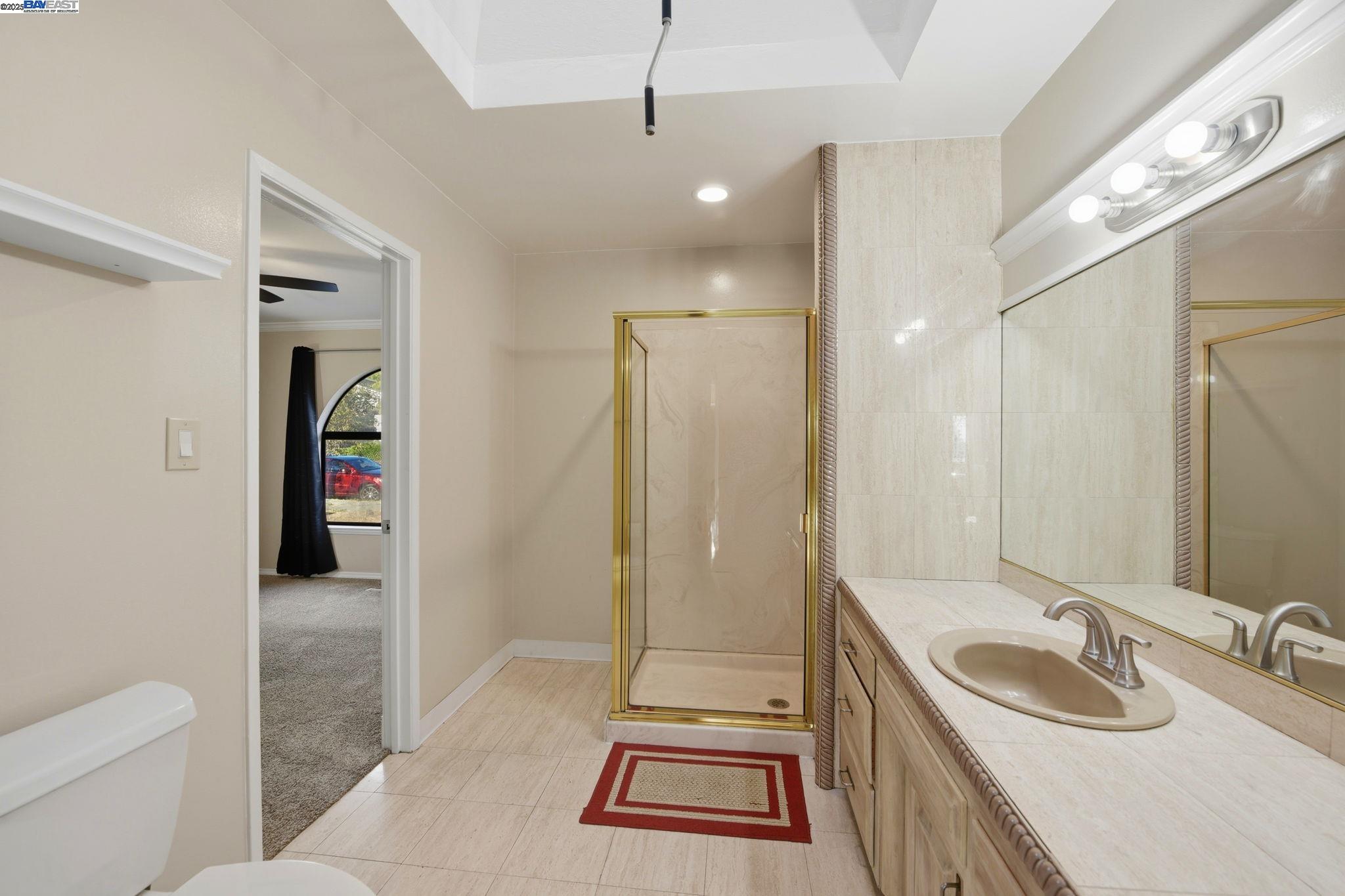 29673 Holiday Street Hayward, CA 94544 - Photo 39 of 47 a bathroom with a sink a toilet and a mirror