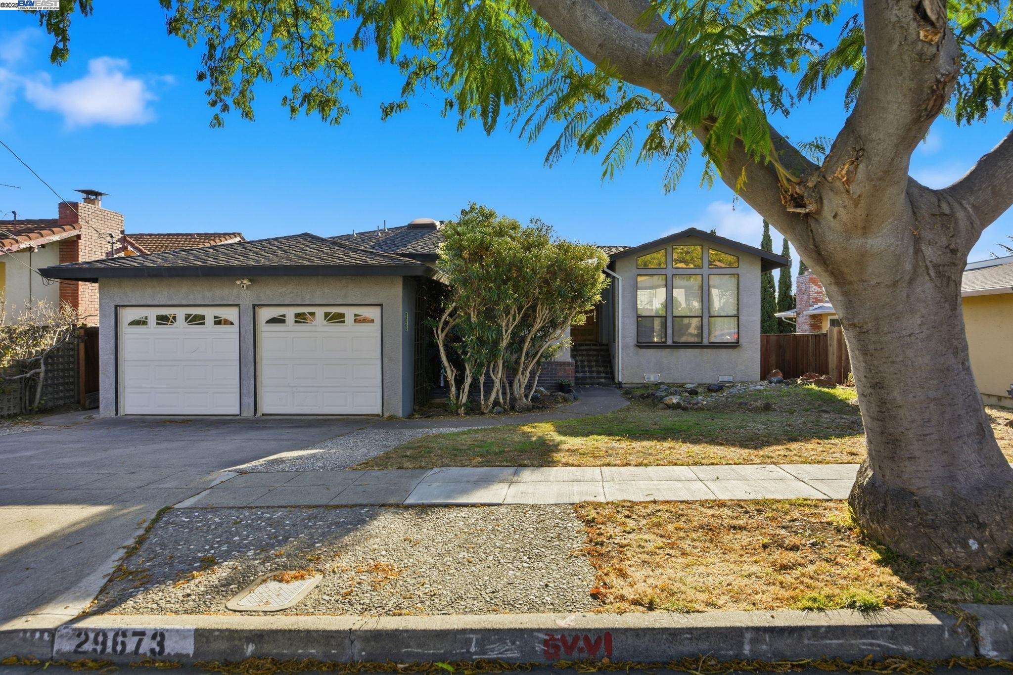 29673 Holiday Street Hayward, CA 94544 - Photo 4 of 47 a view of a house with a tree in front of it