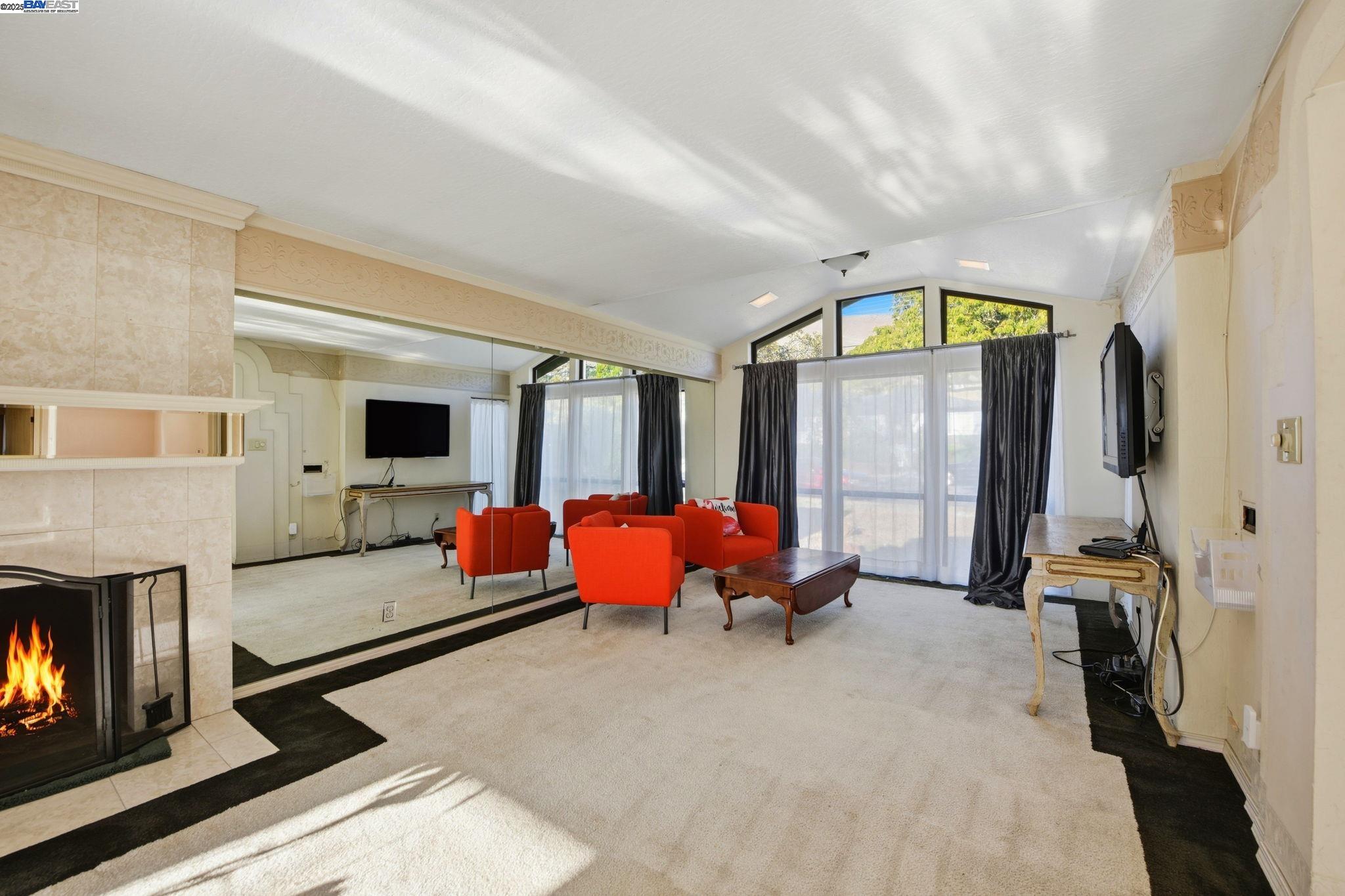 29673 Holiday Street Hayward, CA 94544 - Photo 9 of 47 a living room with furniture and a flat screen tv