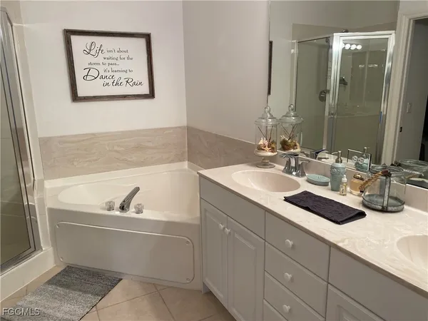 a white toilet sitting next to a small bathroom