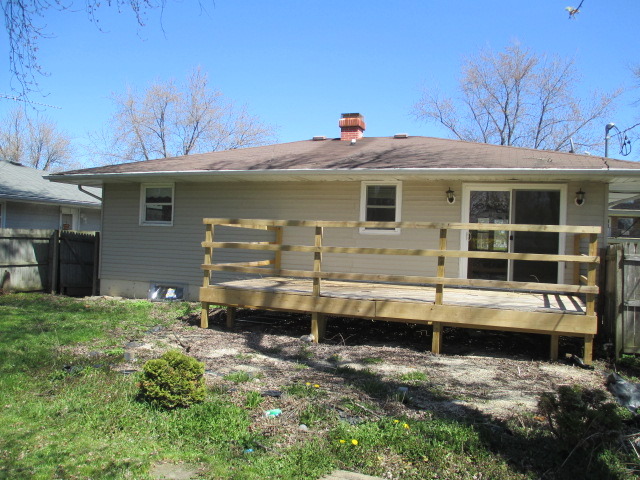2106 Gideon Avenue Zion, IL 60099 - Photo 17 of 20 a view of a house with a yard