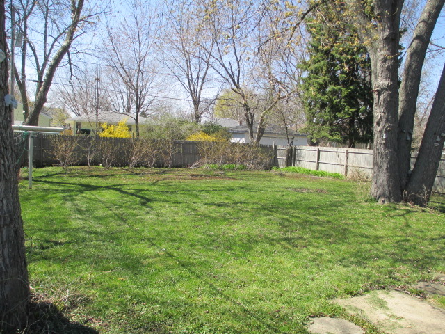 2106 Gideon Avenue Zion, IL 60099 - Photo 19 of 20 a big yard with trees