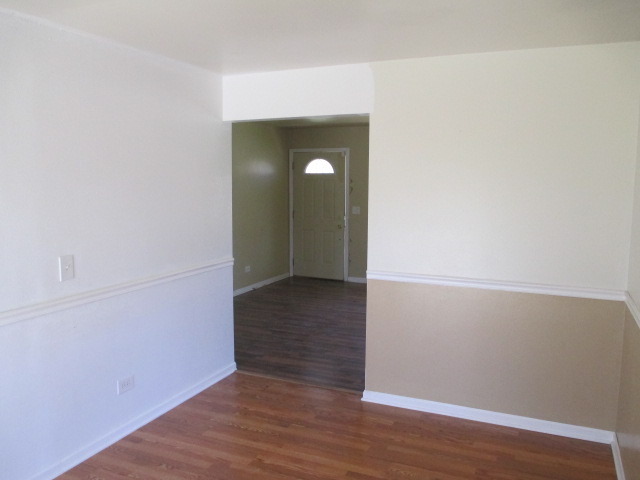 2106 Gideon Avenue Zion, IL 60099 - Photo 5 of 20 a view of a hallway with wooden floor
