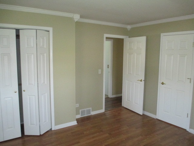 2106 Gideon Avenue Zion, IL 60099 - Photo 10 of 20 a view of entryway with wooden floor