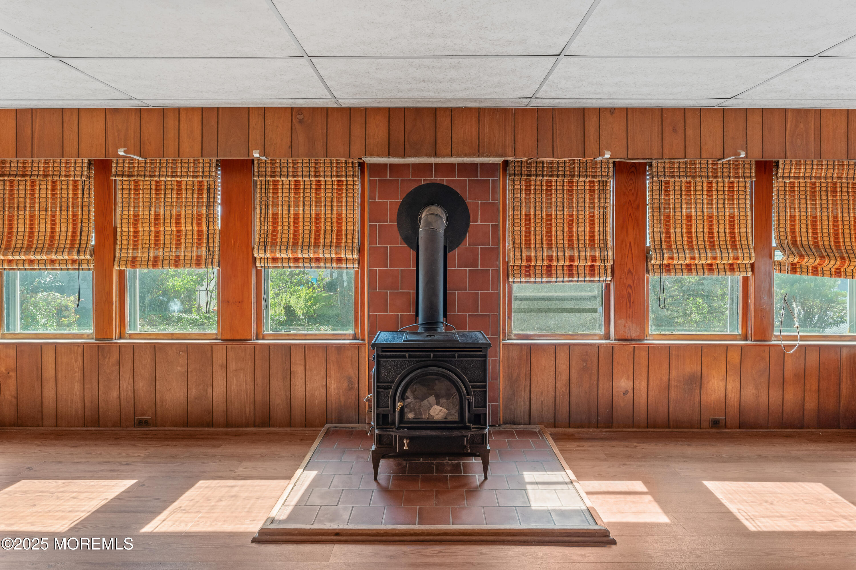 22 Mercer Avenue Port Monmouth, NJ 07758 - Photo 16 of 38 a living room with a fireplace furniture and a window
