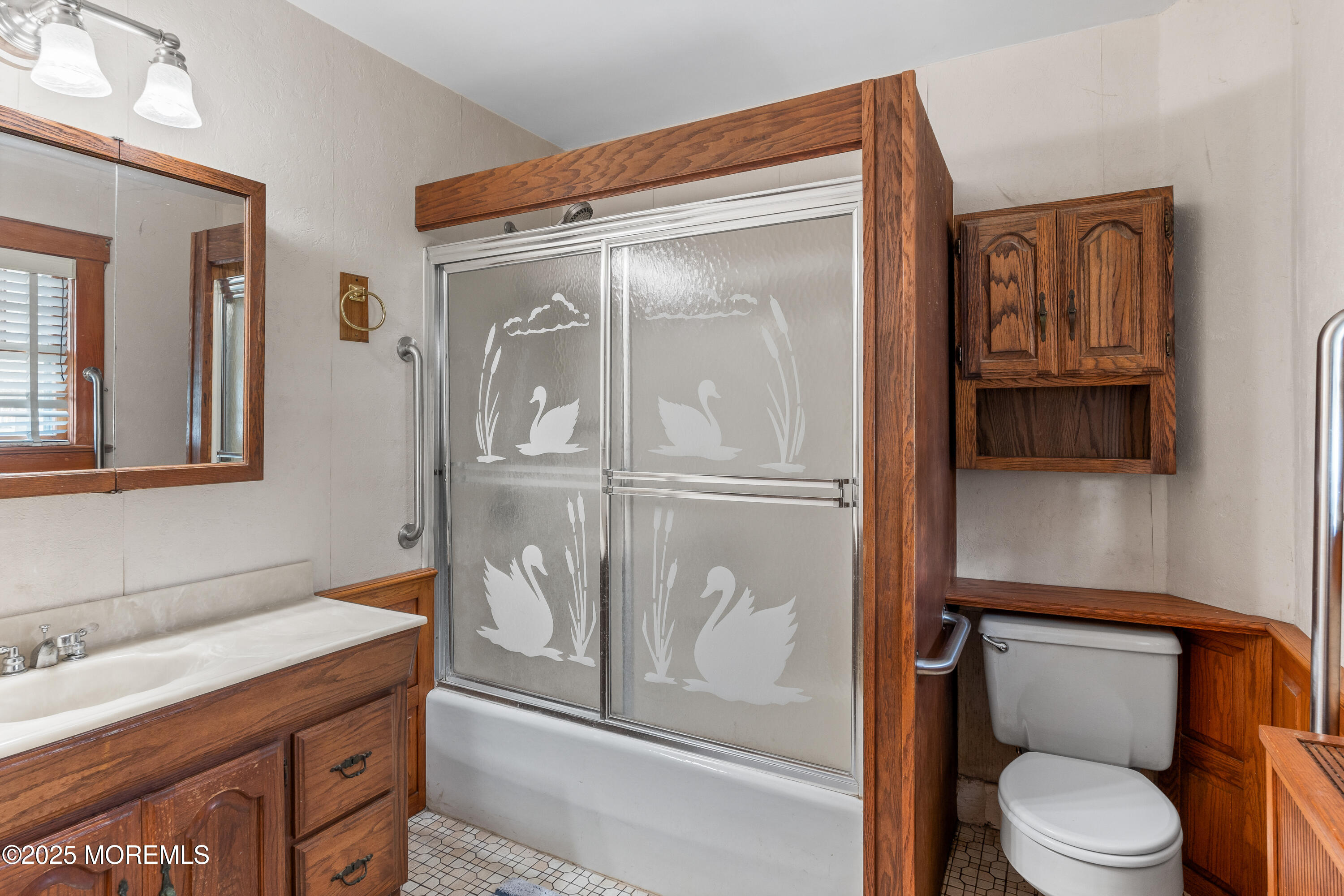 22 Mercer Avenue Port Monmouth, NJ 07758 - Photo 21 of 38 a bathroom with a granite countertop toilet sink and mirror