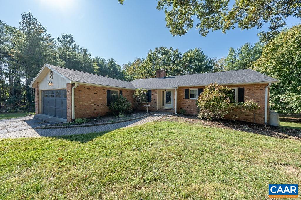 6156 Advance Mills Road Ruckersville, VA 22968 - Photo 1 of 54 a view of a house with roof and a garden