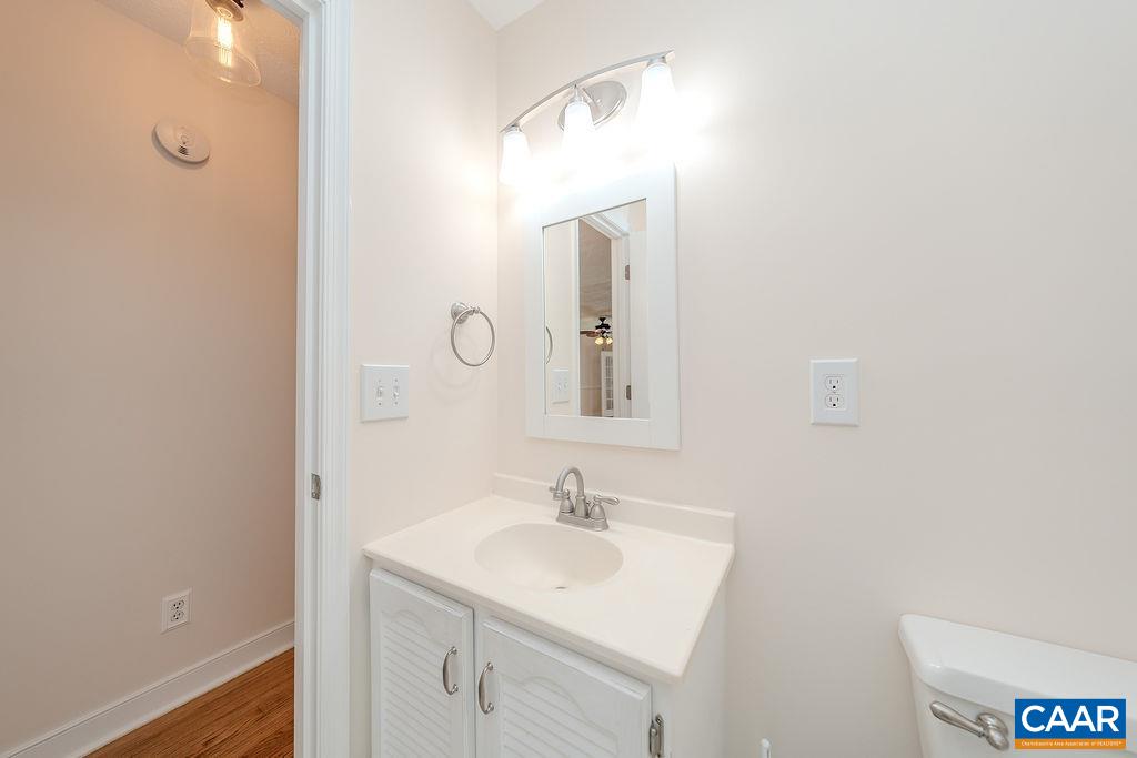 6156 Advance Mills Road Ruckersville, VA 22968 - Photo 23 of 54 a bathroom with a sink and a mirror