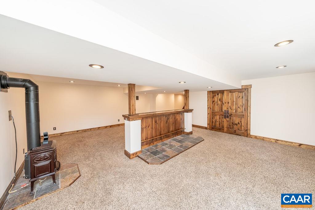 6156 Advance Mills Road Ruckersville, VA 22968 - Photo 27 of 54 a view of a room with gym equipment