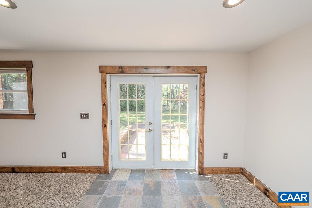 6156 Advance Mills Road Ruckersville, VA 22968 - Photo 28 of 54 a view of an empty room with a window