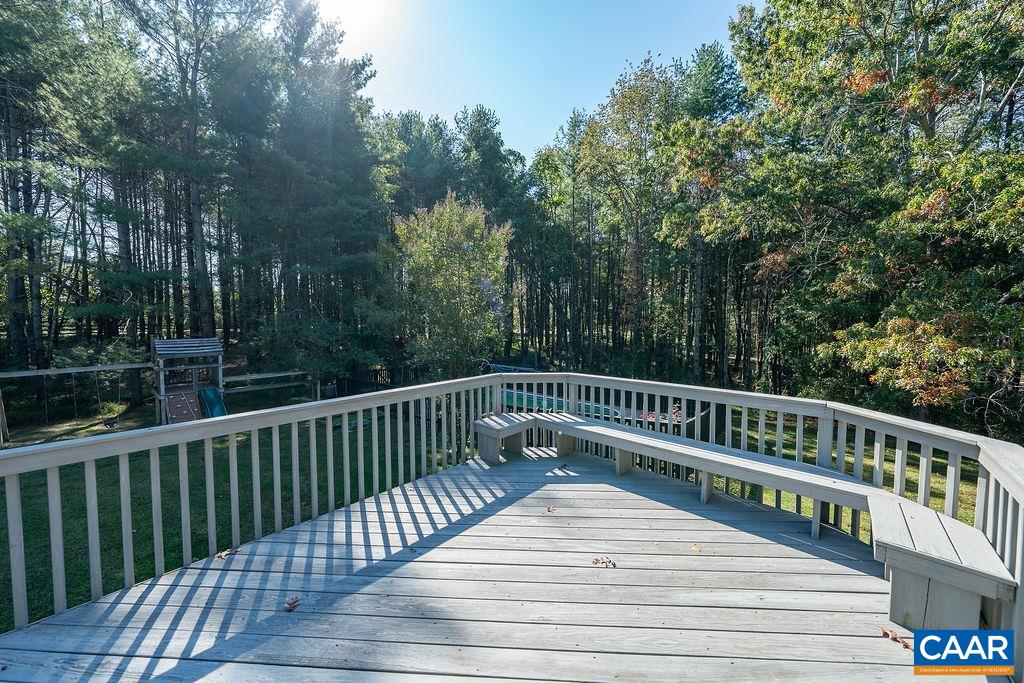 6156 Advance Mills Road Ruckersville, VA 22968 - Photo 30 of 54 a view of balcony with wooden floor and fence