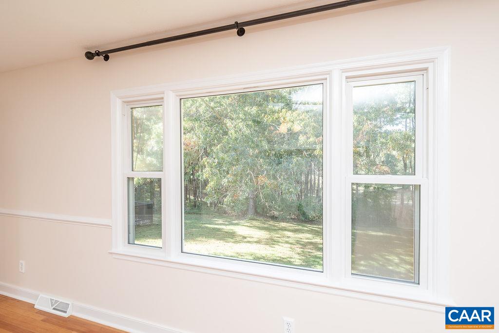 6156 Advance Mills Road Ruckersville, VA 22968 - Photo 3 of 54 a view of a room that has a large window