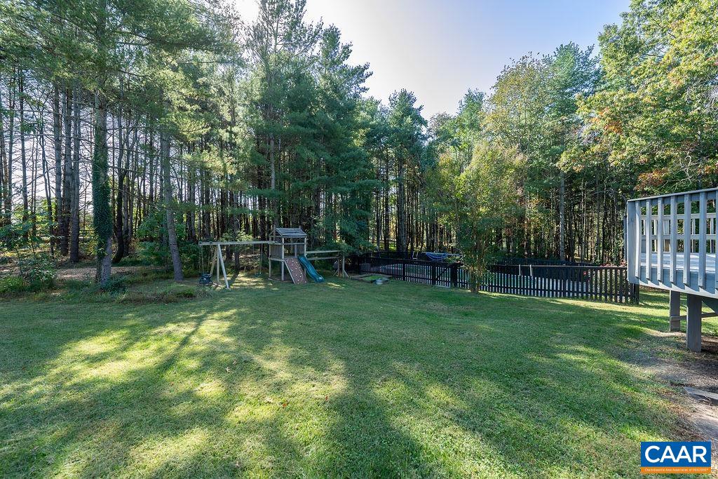 6156 Advance Mills Road Ruckersville, VA 22968 - Photo 34 of 54 a view of house with a backyard