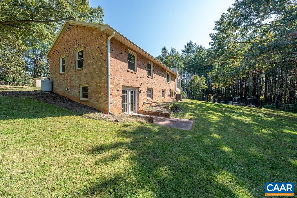 6156 Advance Mills Road Ruckersville, VA 22968 - Photo 38 of 54 a view of a back yard of the house