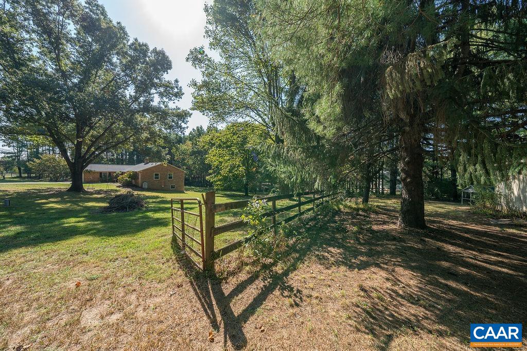 6156 Advance Mills Road Ruckersville, VA 22968 - Photo 40 of 54 a view of a park that has large trees