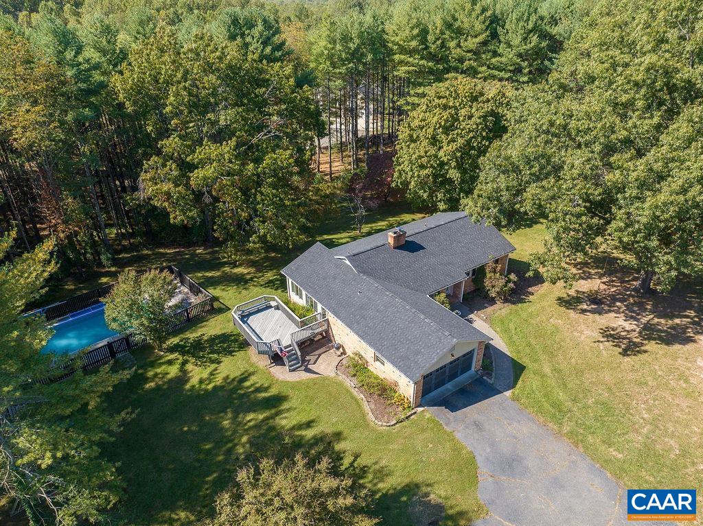 6156 Advance Mills Road Ruckersville, VA 22968 - Photo 45 of 54 a view of a house with a yard