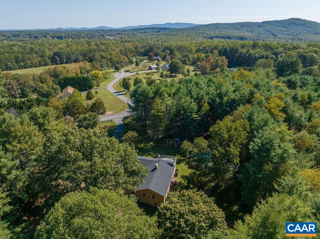 6156 Advance Mills Road Ruckersville, VA 22968 - Photo 50 of 54 an aerial view of residential house with outdoor space and trees all around