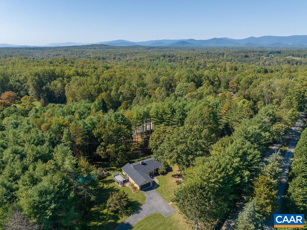 6156 Advance Mills Road Ruckersville, VA 22968 - Photo 51 of 54 an aerial view of a house with a yard