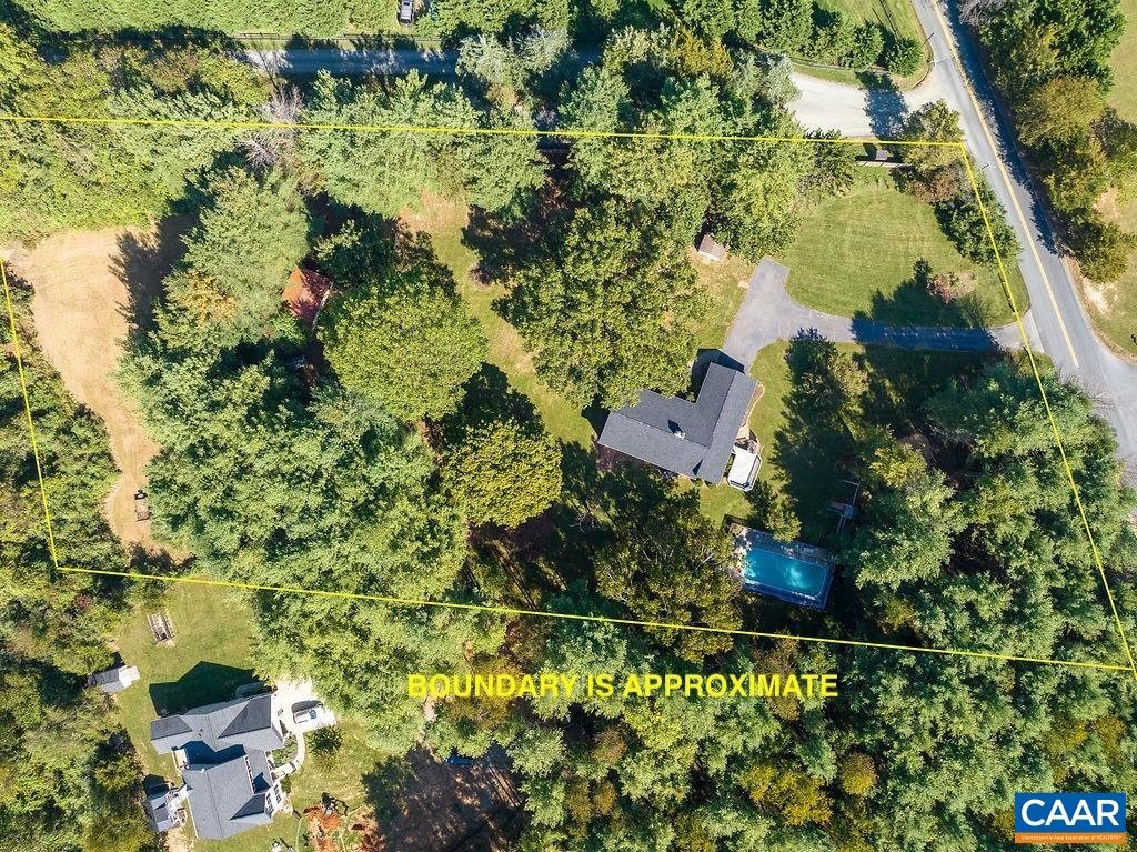 6156 Advance Mills Road Ruckersville, VA 22968 - Photo 52 of 54 an aerial view of residential house with outdoor space and trees all around