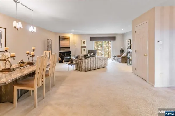a view of a livingroom with furniture and windows