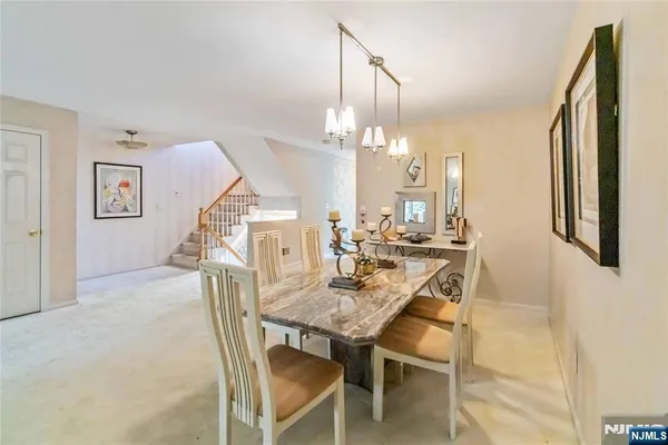a view of a dining room with furniture