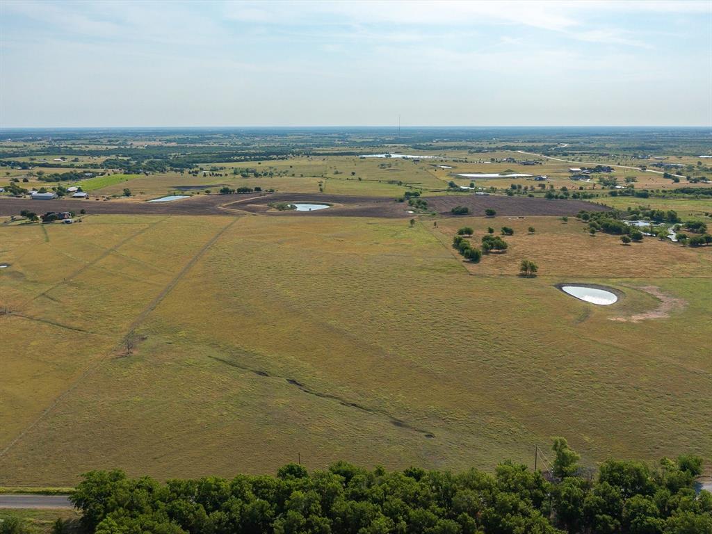 Tbd Lot 9 Tbd Road Ennis, TX 75119 - Photo 9 of 13 a view of an ocean and beach