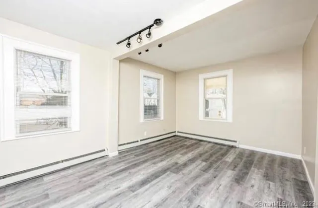 a view of an empty room with a window