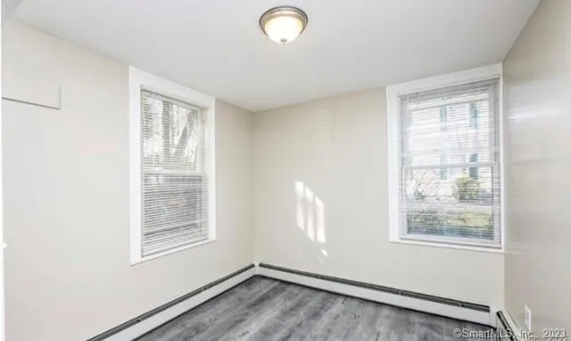 an empty room with windows