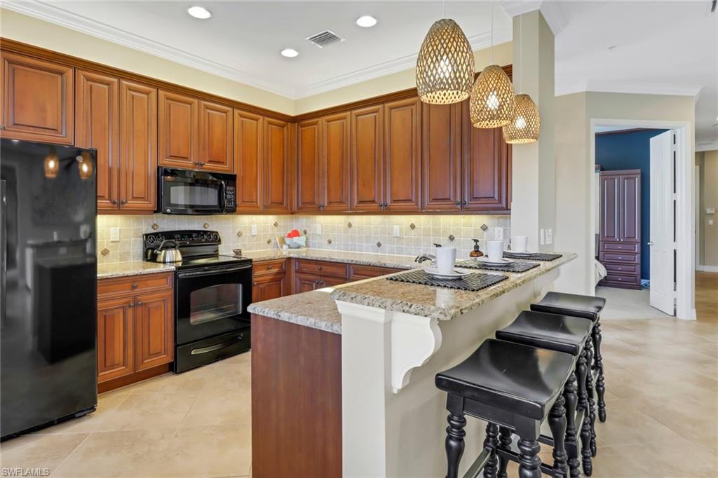6549 Monterey Point, Unit 104 Naples, FL 34105 - Photo 7 of 34 BREAKFAST BAR