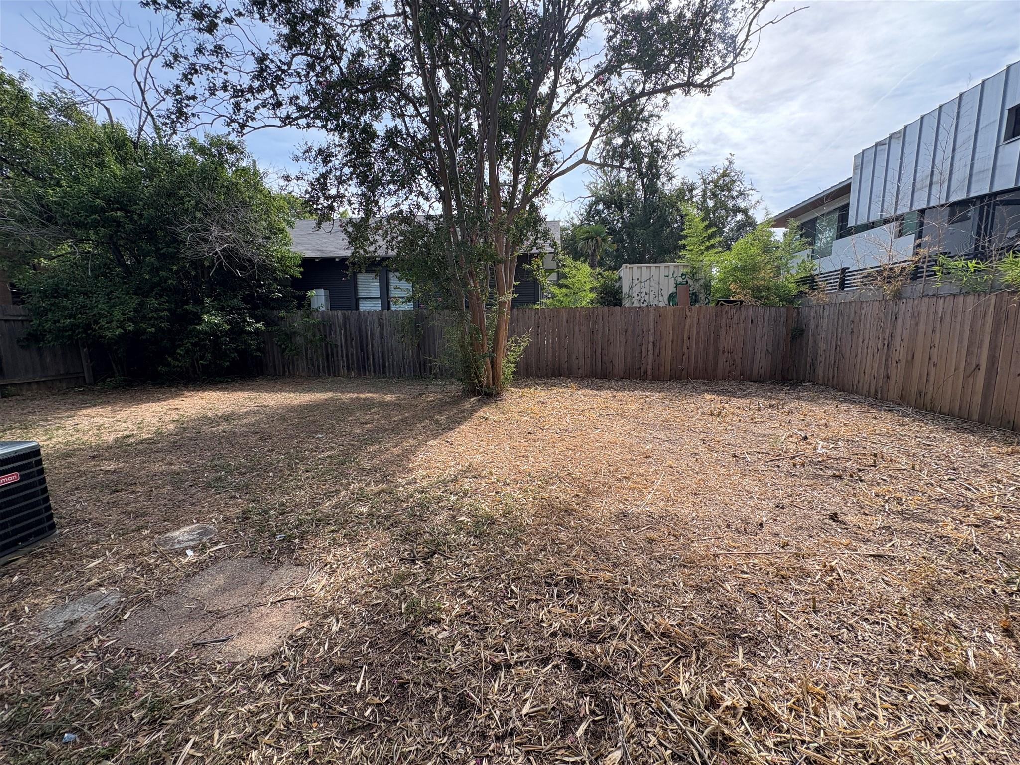 915 West 29th Street Austin, TX 78705 - Photo 20 of 20 Expansive outdoor space featuring a wood fence perimeter