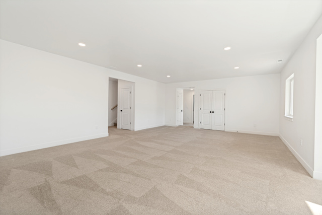 1351 Maple Circle Santaquin, UT 84655 - Photo 32 of 42 Spacious interior room featuring light-toned patterned carpeting and recessed ceiling lighting