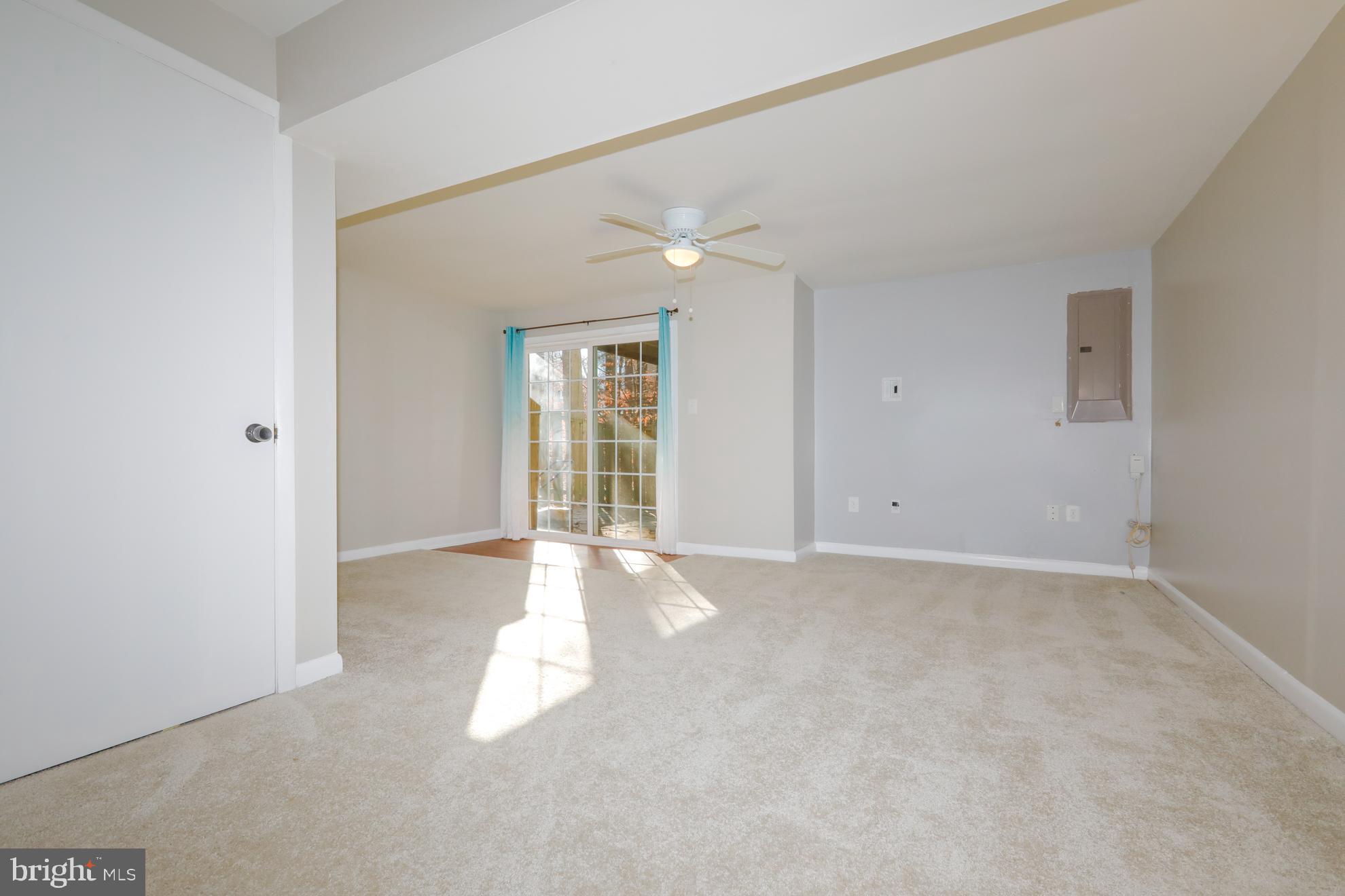 15334 Inlet Place Dumfries, VA 22025 - Photo 19 of 32 an empty room with windows and bathroom view