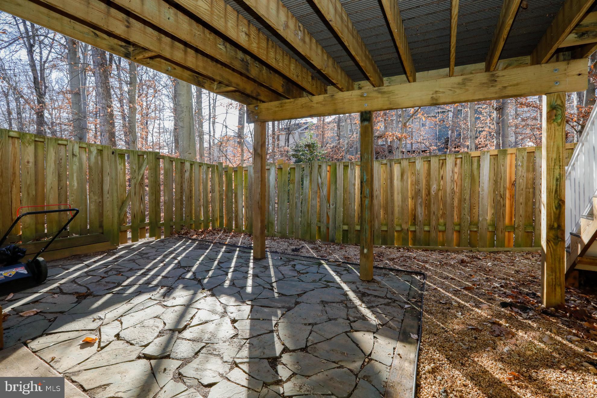 15334 Inlet Place Dumfries, VA 22025 - Photo 23 of 32 a view of a backyard of a house