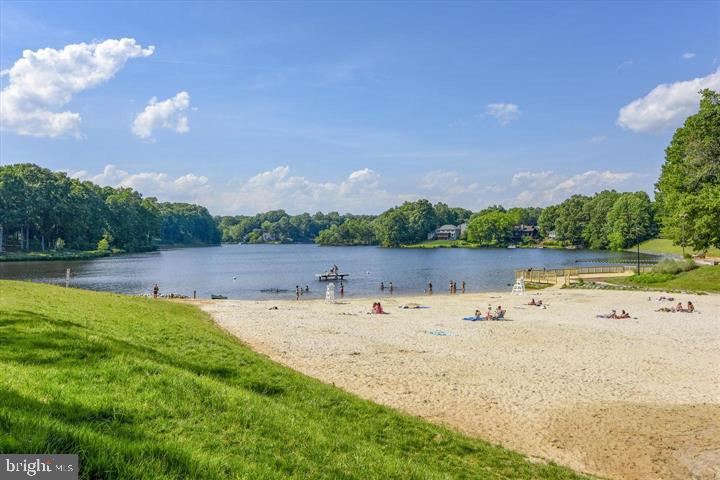 15334 Inlet Place Dumfries, VA 22025 - Photo 25 of 32 a view of a lake with houses in the back