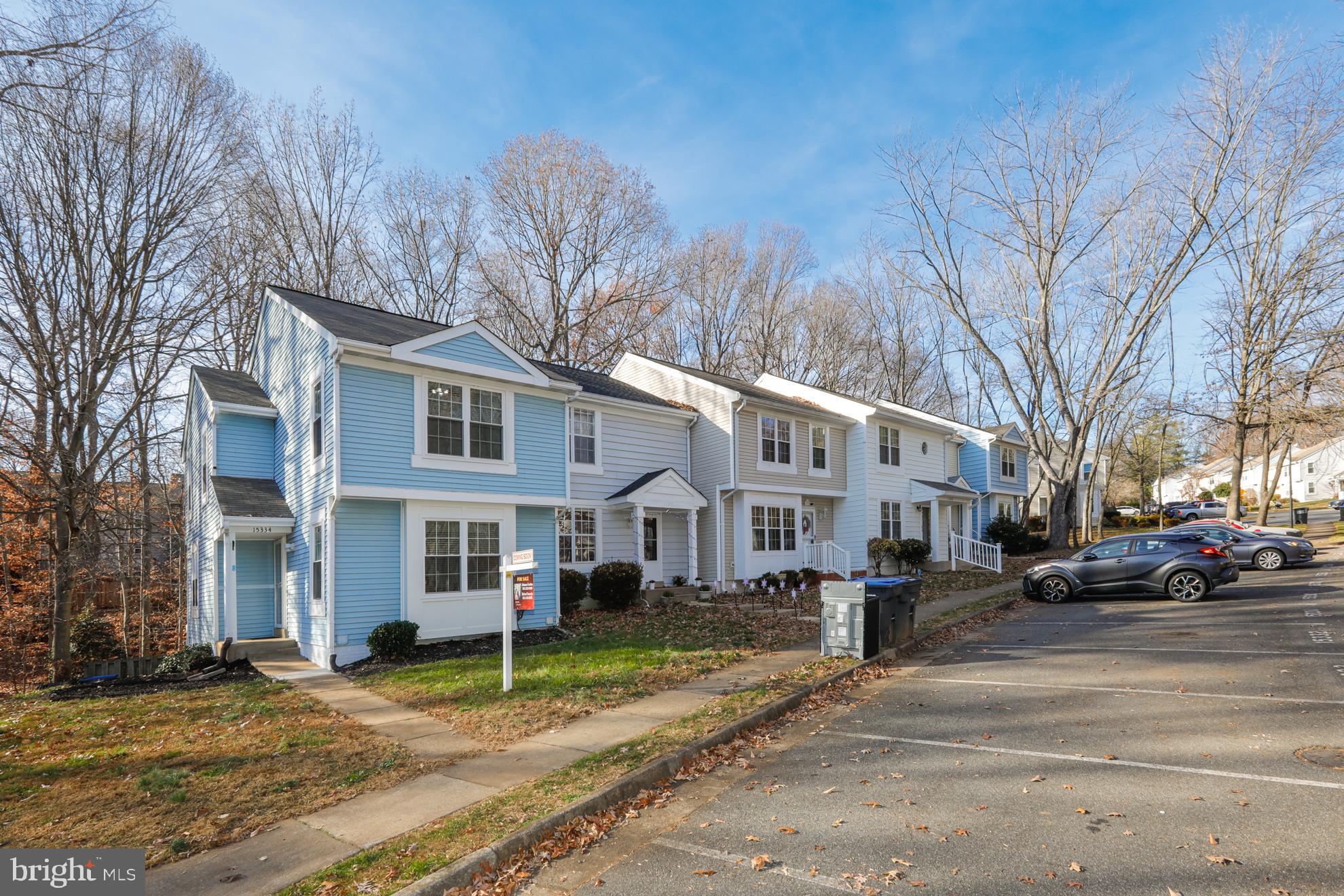 15334 Inlet Place Dumfries, VA 22025 - Photo 3 of 32 a street that has couple of cars parked on it