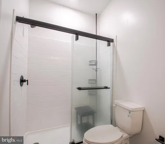 an empty room with wooden floor