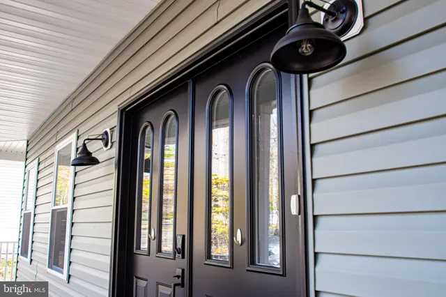 a view of a balcony with wooden floor