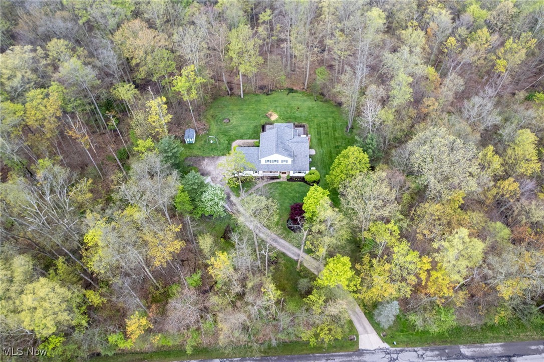 14566 West Ridge Road Novelty, OH 44072 - Photo 6 of 49 Drone / aerial view featuring a wooded view